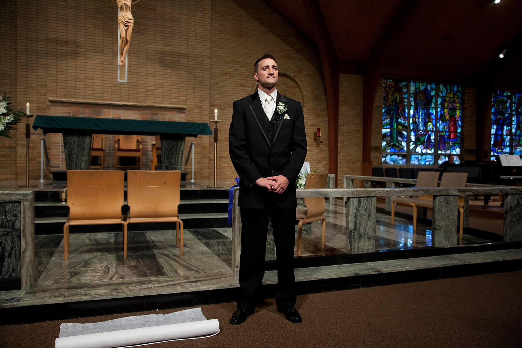 Groom at the altar